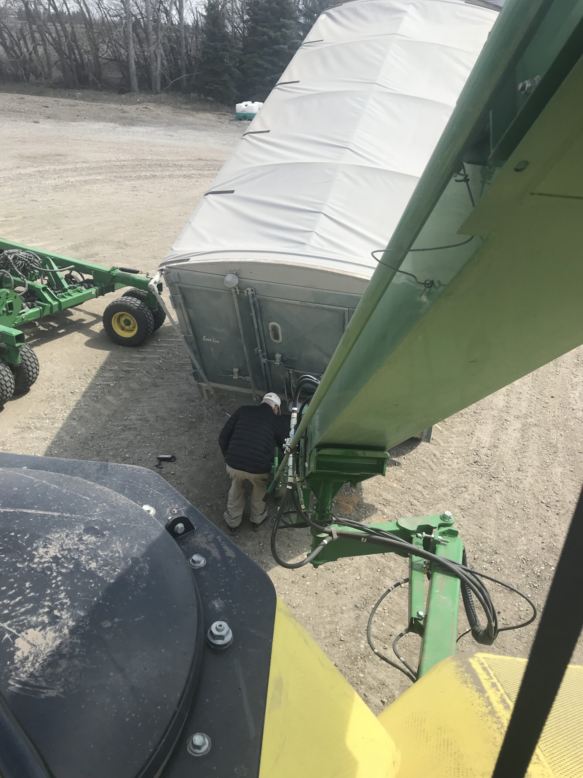 IMG-2808 Farmer working at a bin connected to a truck